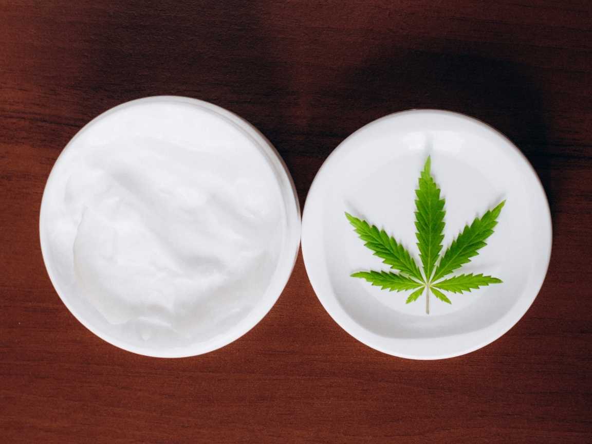 Two pots of cannabis topical cream