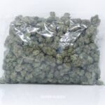 Super Nuken's deep green and purple buds coated in resin, wholesale bag